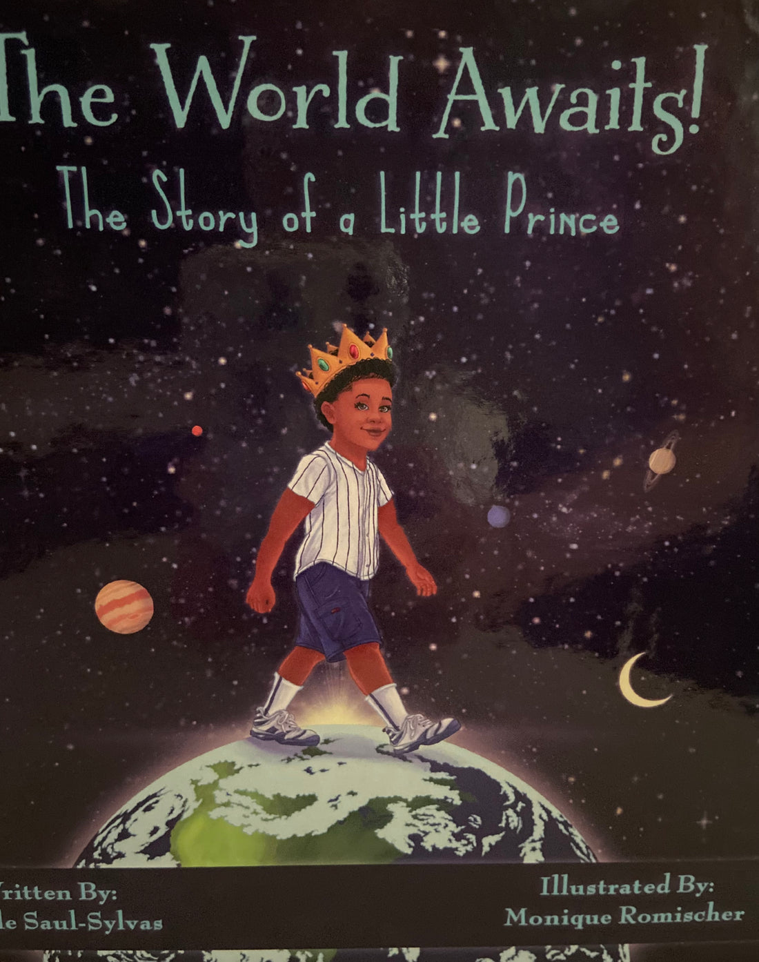 The World Awaits: The Story of a Little Prince by Irealle Saul-Sylvia